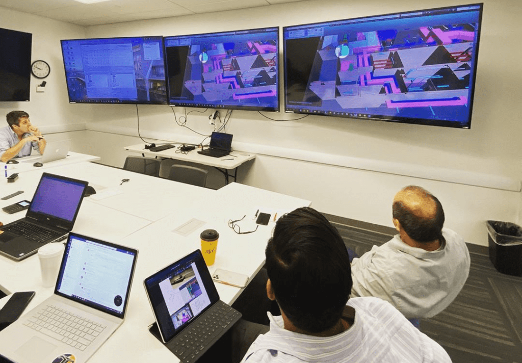 Figure 2.0 An awesome #BIMCave from the team at Titan AEC using Logitech presenter to focus on clashes during BIM coordination with design team and trade contractors using BIM 360 and BIM Track. 